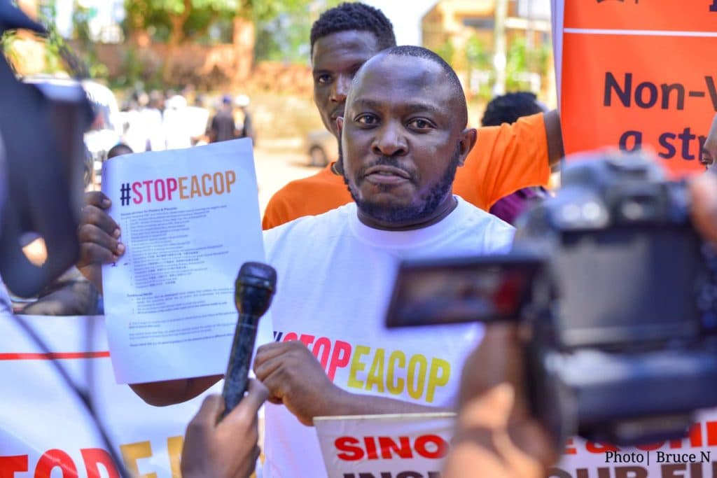 Speaking to the press during a campaign action