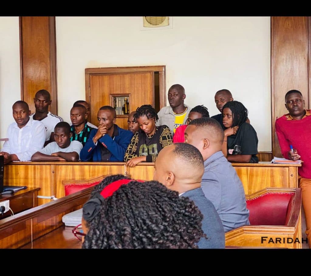 Community supporters inside a legal proceeding